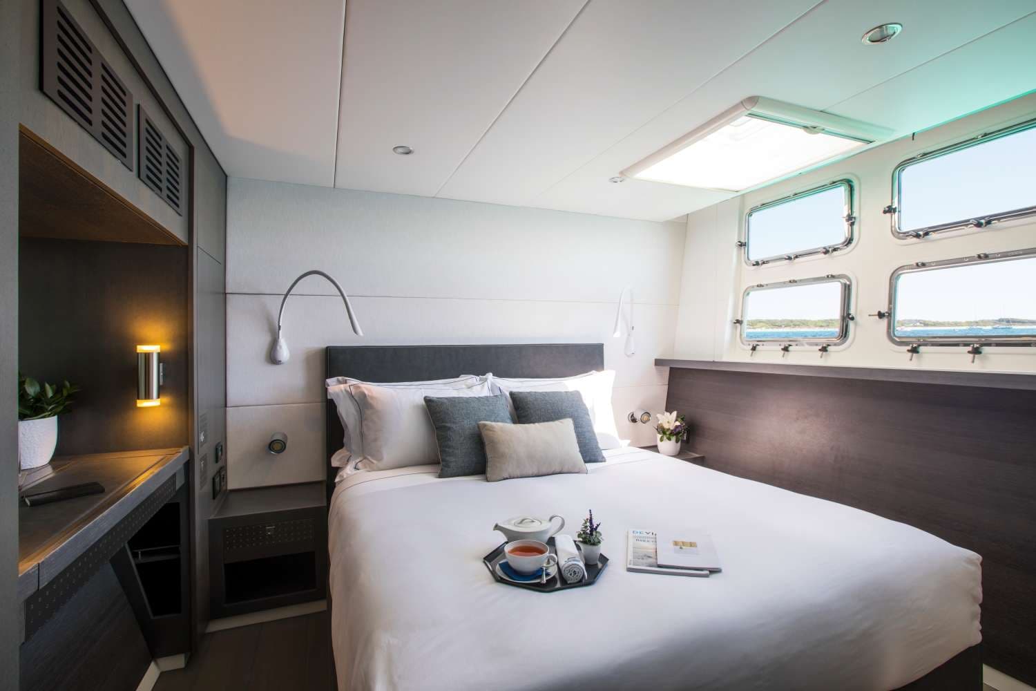 Queen guest cabin in blue and white, en-suite